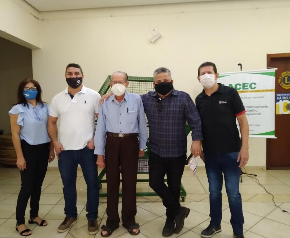 Membros da diretoria da ACEC em close após sorteio realizado no dia 11 de maio